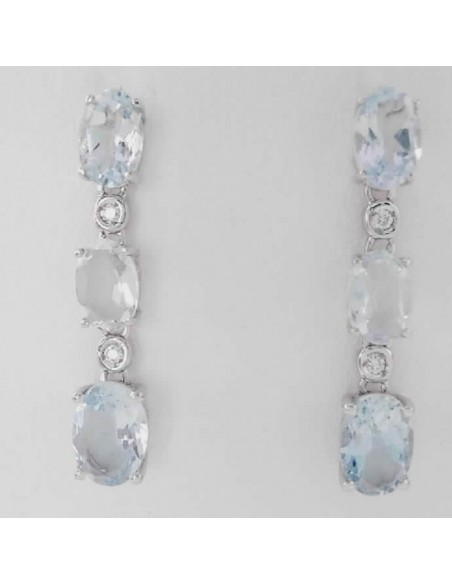 Pendientes oro Aguamarina y Brillantes con cierre de presion fabricados en oro blanco de 18 ktes